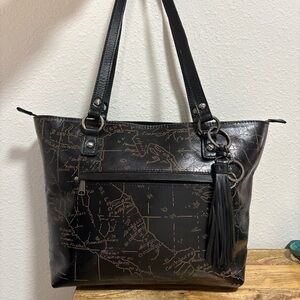 Patricia Nash Benvenuto tote bag in brown leather with a map print